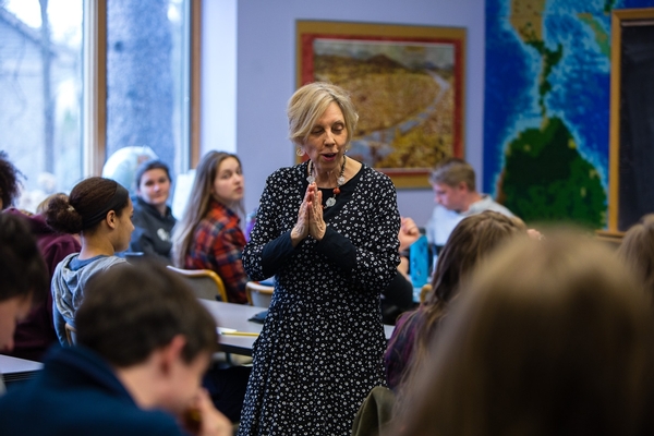 High School teacher presenting to class