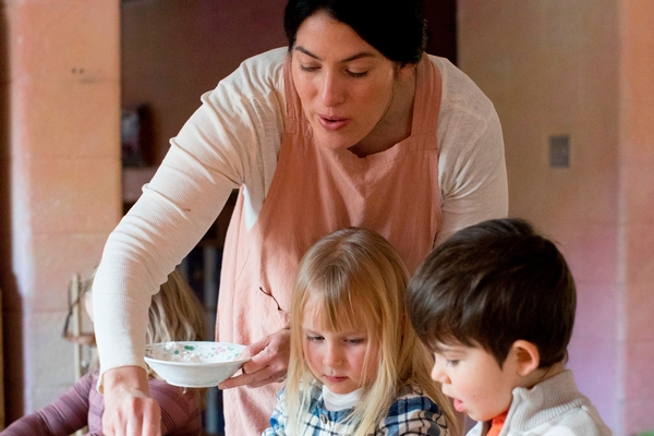 Early Childhood Teacher baking with students