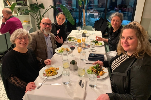 Group of Parents and Teachers at Dinner Event