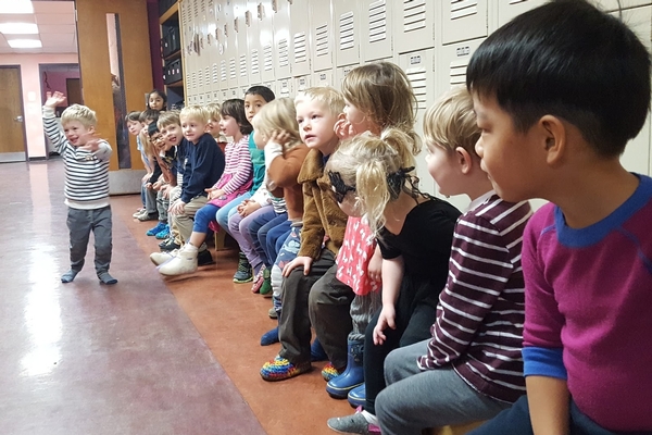 Early Childhood group in school hallway