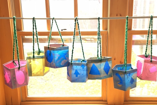 Cheerful lanterns in window