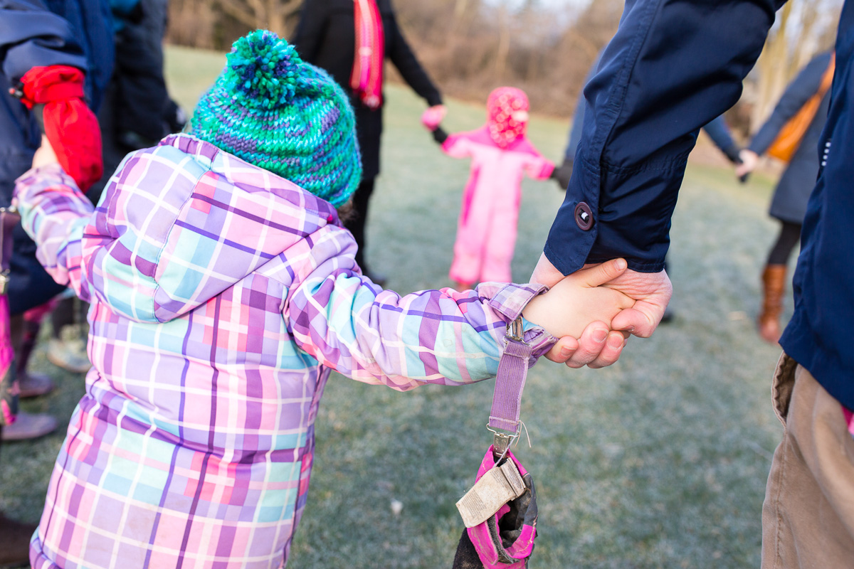 Parent and Child Holding Hands