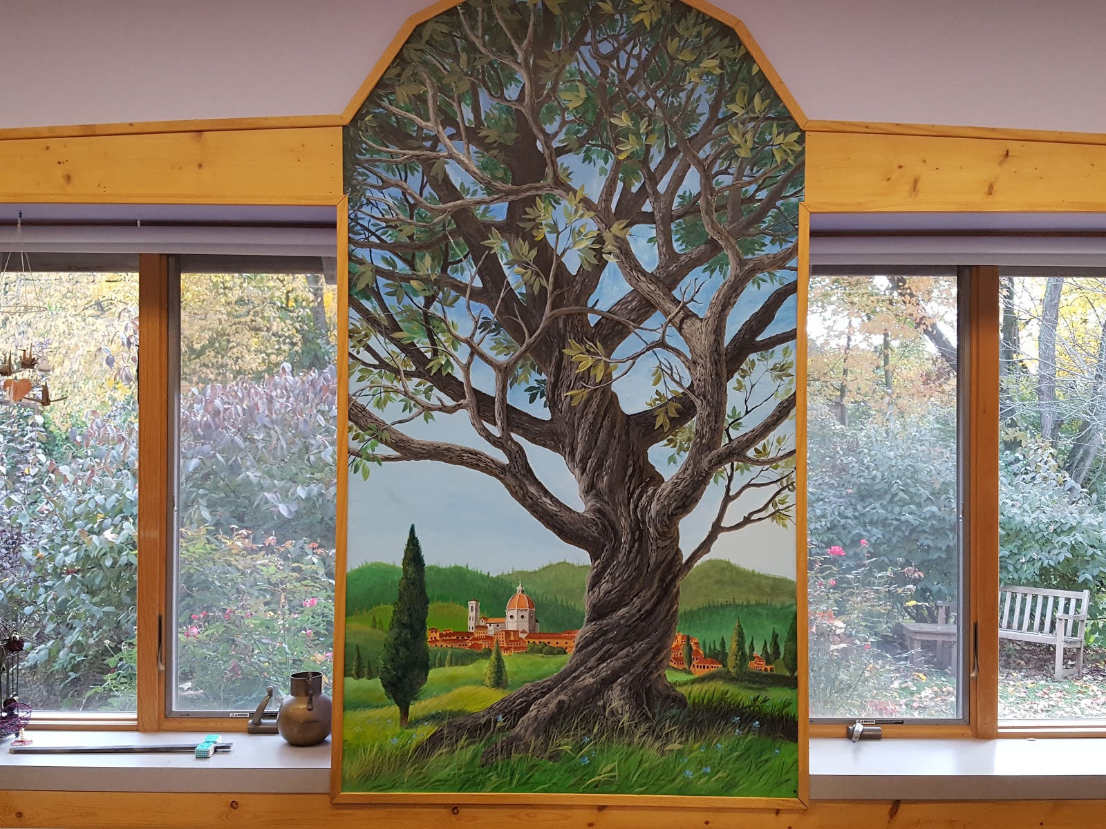 Tree mural between two windows