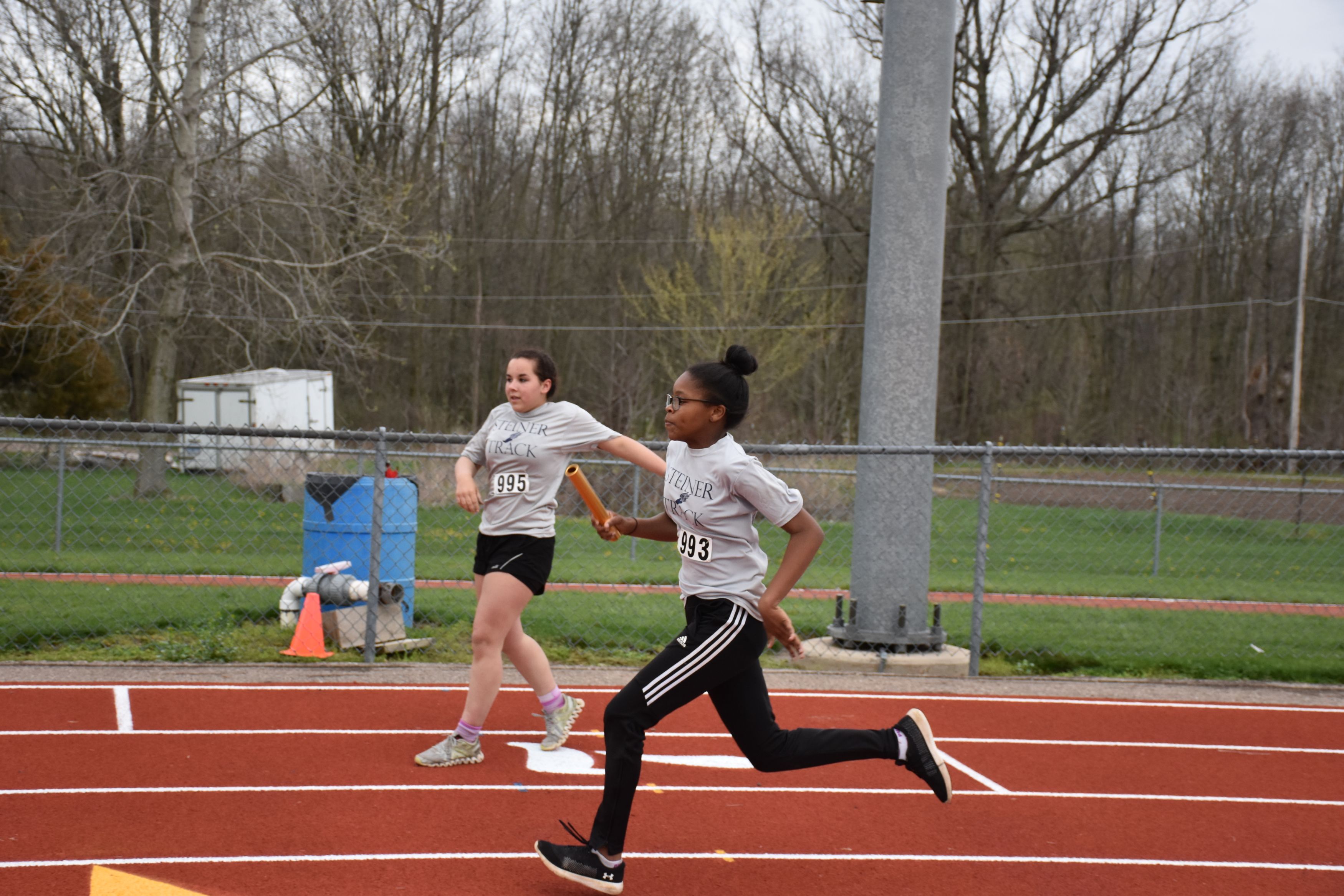 Students running track