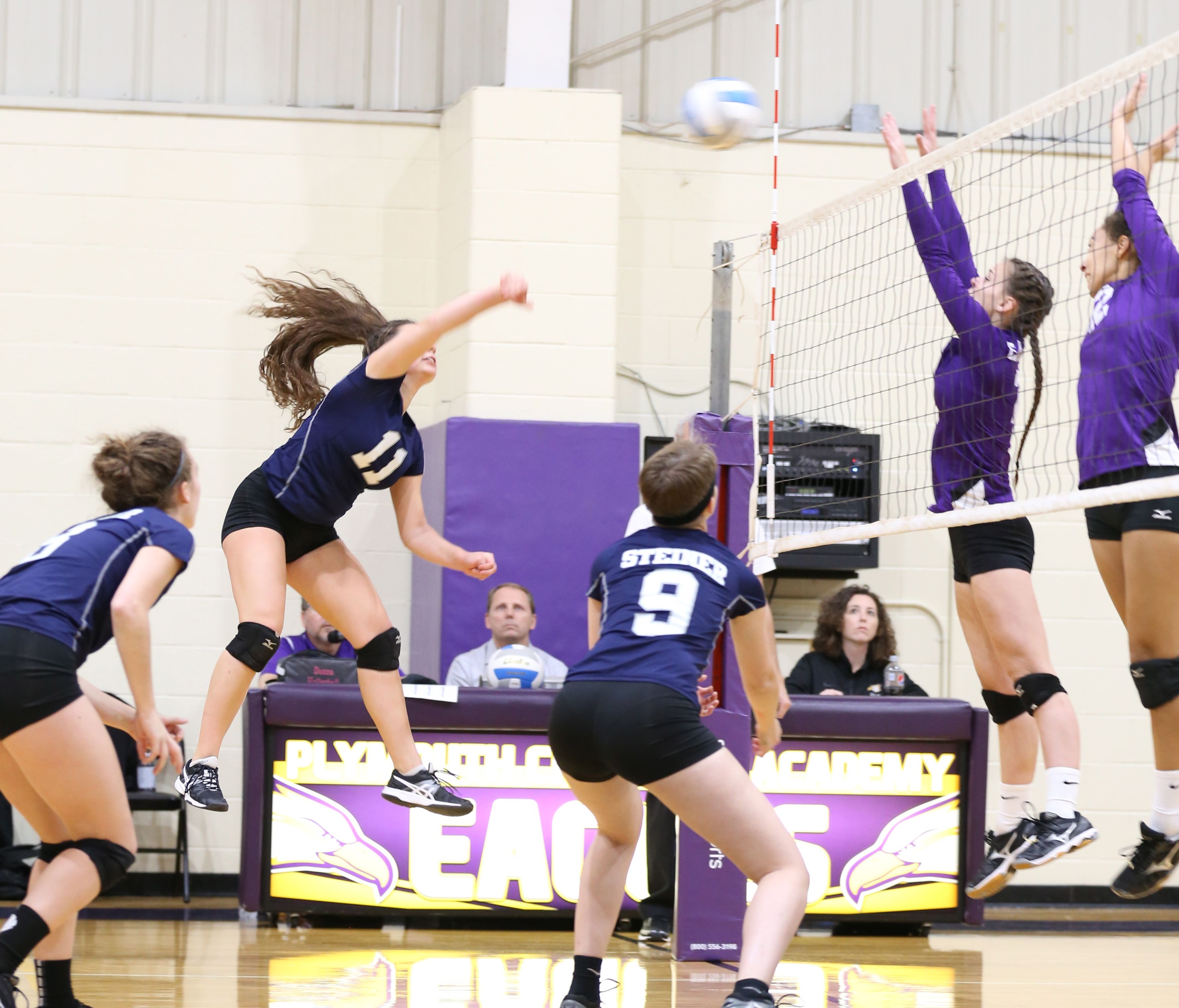 Girl Hitting Volleyball